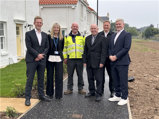 Council colleagues and Cruden Homes representatives at the new council houses at Longniddry South