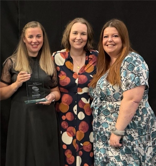 Collecting the award are (left to right) Diana Murray, Claire Clarke and Siobhan Murphy.